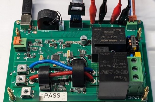 An assembled board on the bench wearing its PASS label